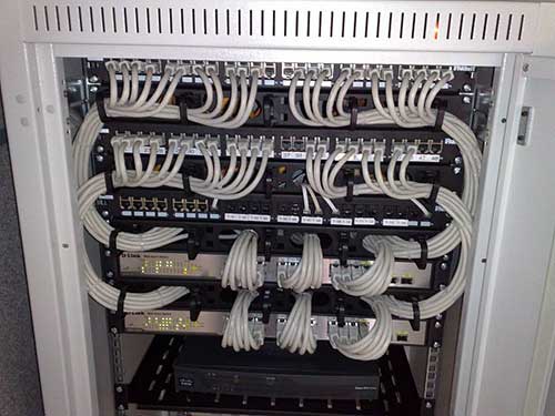 This figure shows a real rackmount with several Ethernet switches. This figure shows a real rackmount with several Ethernet switches.