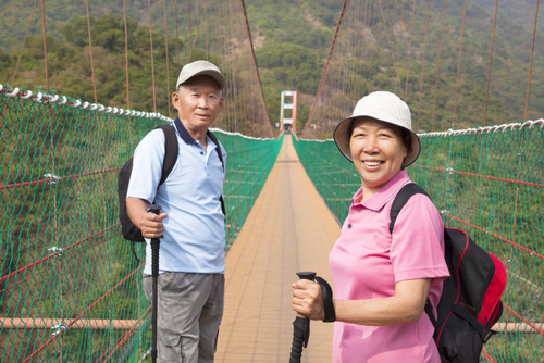 Senior couple on the bridge in nature park
