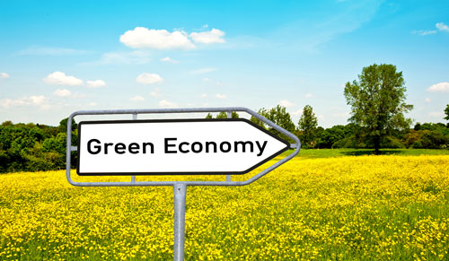 green economy road sign