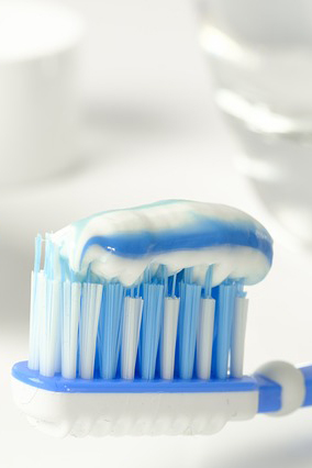 A toothbrush loaded with toothpaste.
