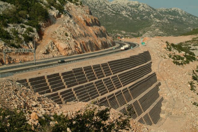 Reinforced earth with gabions supporting a multilane roadway, Sveti Rok, Croatia